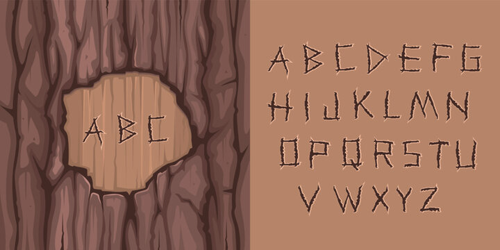 Carved wood alphabet with tree bark texture background