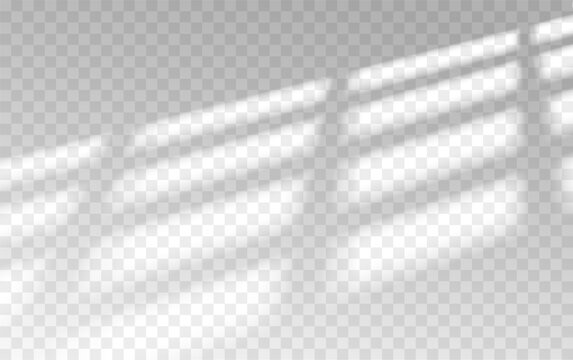 Sunlight shadows on transparent surface with grid pattern