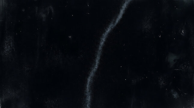 Dark grunge film texture with dust and scratches for vintage aesthetic overlays.