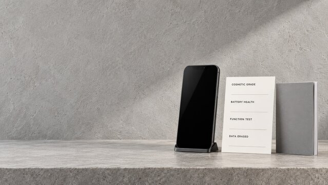 Premium refurbished smartphone on display stand with cosmetic grading and data erased certification card