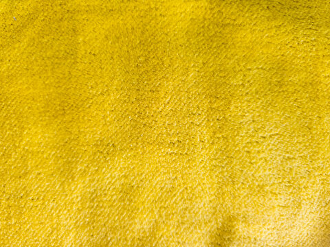 Vibrant bright yellow soft microfiber fabric texture