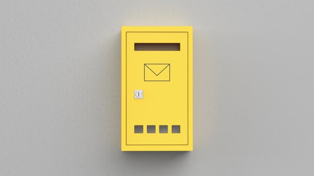 Yellow mailbox on grey wall