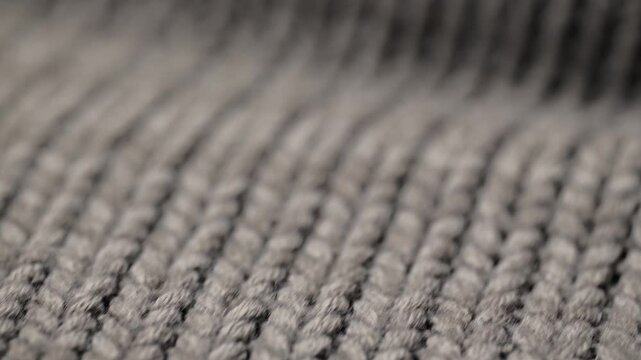 Close up view of brown knitted fabric texture