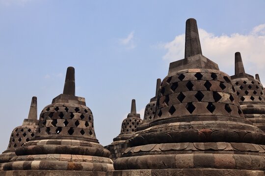 Ancient Stone Stupas at Borobudur Temple with Blue Sky, Central Java, Indonesia
