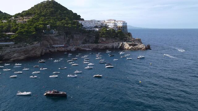 Flight near Cap Sa Sal resort complex on a rugged cliff between coastal coves. Aerial view of Begur, Costa Brava, Girona, Catalonia, Spain
