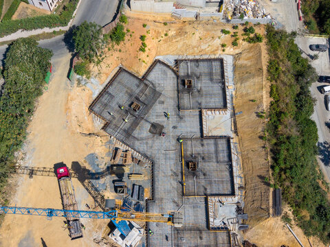 Construction Site Tower Crane And Reinforced Concrete Foundation Rebar