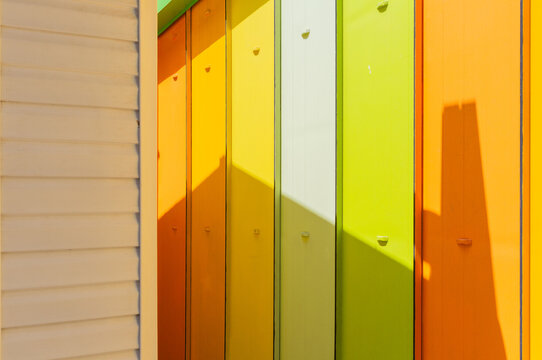 Colorful Panel Wall with Strong Sunlight and Shadow Pattern