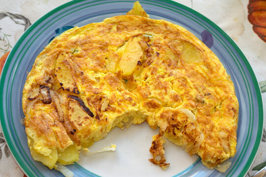Sliced potato omelette on plate