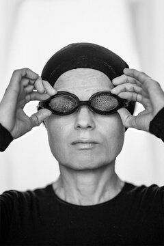 Close-up Portrait of a Female Swimmer with Goggles