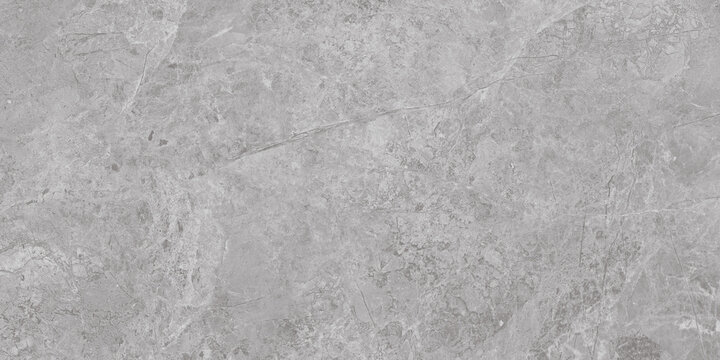 Gray stone texture with subtle cloudy markings and fine irregular veins, neutral mineral surface background with soft tonal variation for interior decoration, wall finishes, flooring and visual design