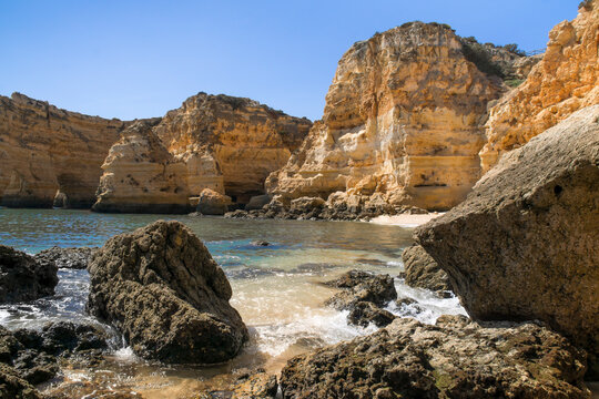 The beautiful cliffs and rocks of Marinha Beach, Algave, Portugal. Ultimate summer vibe.