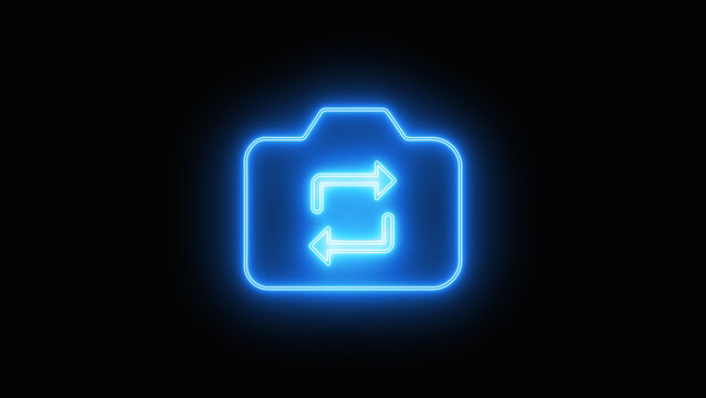Colorful neon icon representing a flip camera or selfie rotation mode with circular arrows inside a digital photo camera silhouette isolated on black background