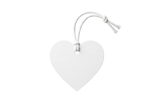 White heart shaped tag with string for gift message during special celebrations