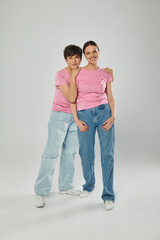 Fototapeta premium Women of all ages unite for breast cancer awareness and support