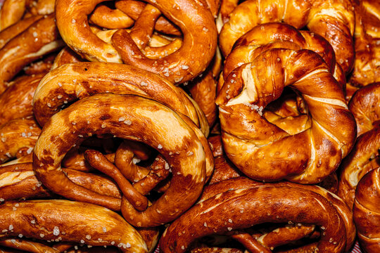Variety of freshly baked breads, buns, and pastries displayed at an open buffet station.