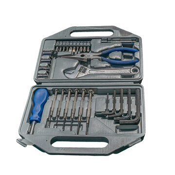 An open gray plastic carrying case displaying a comprehensive hand tool kit including needle-nose pliers, an adjustable wrench, precision screwdrivers, Allen keys, and driver bits.