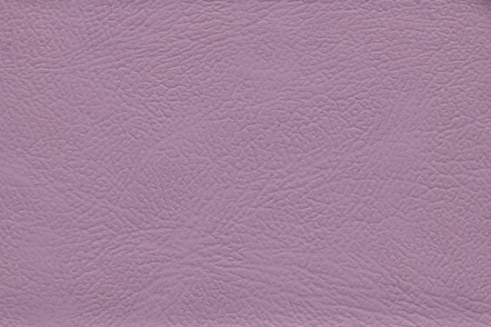Purple leather texture background close up