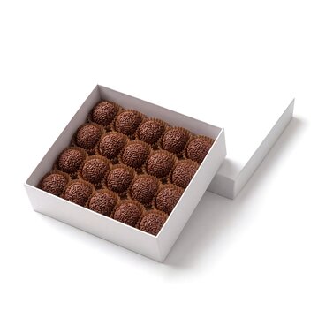 Open blank white gift box with Brazilian brigadeiros chocolate truffles in paper cups, plain confectionery packaging mockup on white