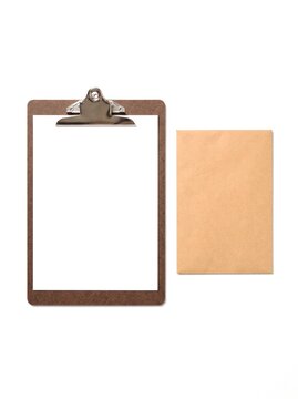Brown clipboard with blank white paper sheet and kraft envelope, plain document and stationery mockup flat lay on white background