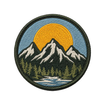 Circular embroidered patch featuring a scenic mountain landscape with a large yellow sun, green trees, and a blue river, isolated on white