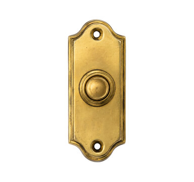 Antique brass doorbell button with an ornate rectangular backplate and a central round push button, isolated on a white background