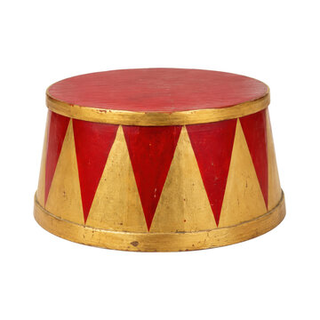 Vintage red and gold circus pedestal with a harlequin pattern, isolated on a clean white background