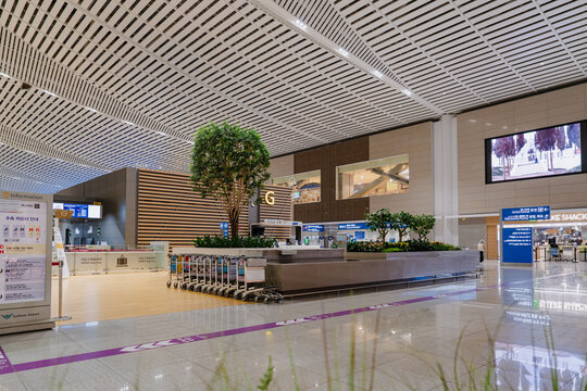 September 23, 2026, Incheon, South Korea - Interior view of Incheon International Airport Terminal 2 with information desks and a Shake Shack.