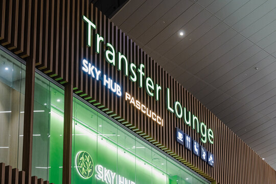 September 23, 2026, Incheon, South Korea - Illuminated "Transfer Lounge" sign with "Sky Hub" and "Pascucci" branding at Incheon Airport Terminal 2