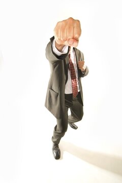 Angry businessman boxing