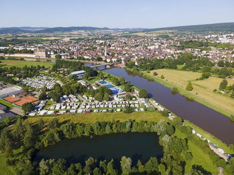 Drone shot of the river Weser with camper site and campground, Holzminden, Weserbergland, Lower Saxony, Germany