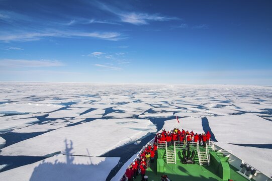 Expedition ship navigating through the pack ice in the Arctic, Svalbard, Norway