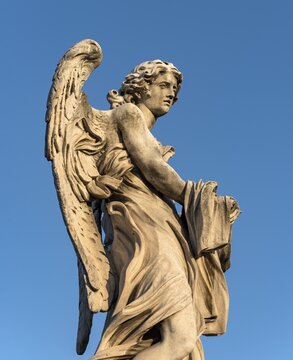 Angel with Garment and Dice statue, Ponte Sant'Angelo bridge, Rome, Italy