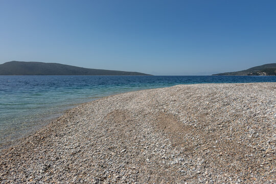 Agios Dimitrios, white pebbled beach, located on the eastern side of Alonnisos, Greece