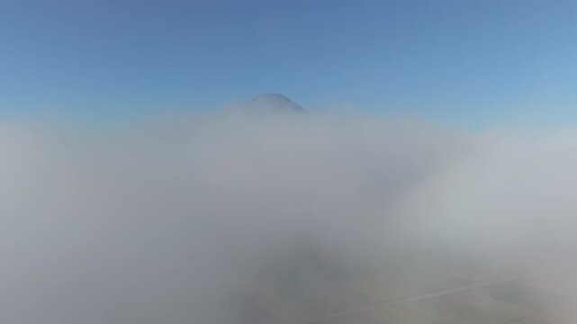 Fly Up From Sea of Clouds to Reveal Mount Fuji (Aerial | Real Time | Reveal Shot)