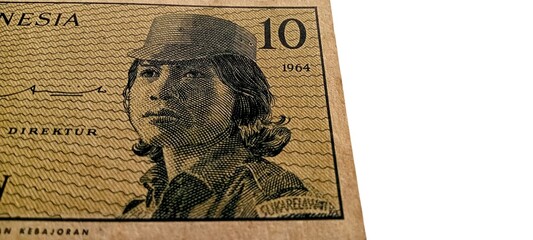 BANDAR LAMPUNG, INDONESIA - 10 OKTOBER 2026: Detailed partial view close up of a vintage 10 Sen Indonesian banknote... © Yusman