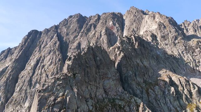 Aerial view of hikers trekking up Vall de Molieres towards Molieres peak with Aneto glacier view in Spanish Pyrenees