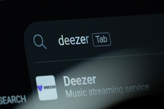 Paris, France - 09 Aug 2026: Search result for Deezer is seen on a digital screen.