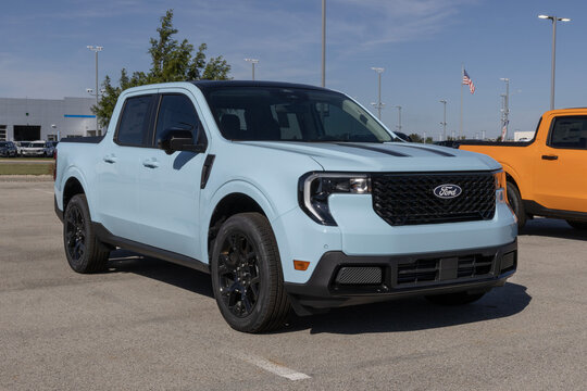 Ford Maverick AWD Lariat pickup truck at a dealership. Ford offers the Maverick with a 2.0L EcoBoost engine. MY:2026