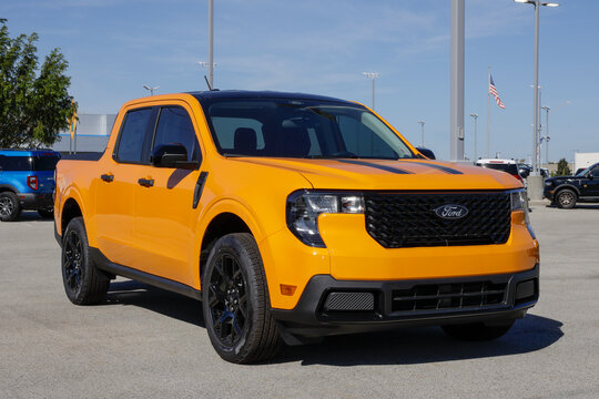 Ford Maverick AWD XLT Hybrid pickup truck at a dealership. Ford offers the Maverick with a 2.5L Hybrid engine. MY:2026