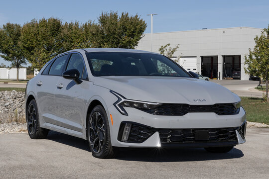 Kia K5 GT-Line FWD sedan at a dealership. Kia offers the K5 with a 2.5L Direct Injection 4-Cylinder engine. MY:2026