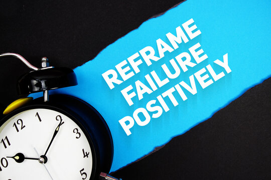 Reframe Failure Positively with alarm clock on blue background