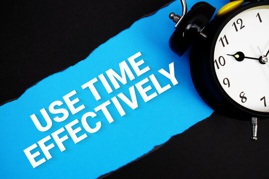 Use Time Effectively with alarm clock on blue background