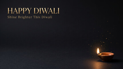 Diwali festival greeting card with glowing clay diya lamp and golden © Soham