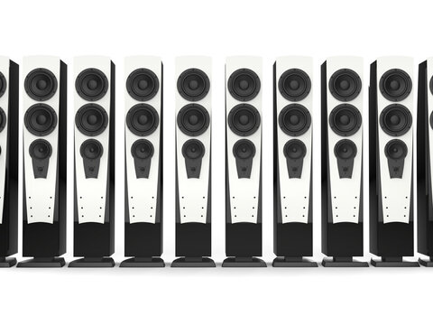 High tower sound speakers with shiny white panels and black base casing