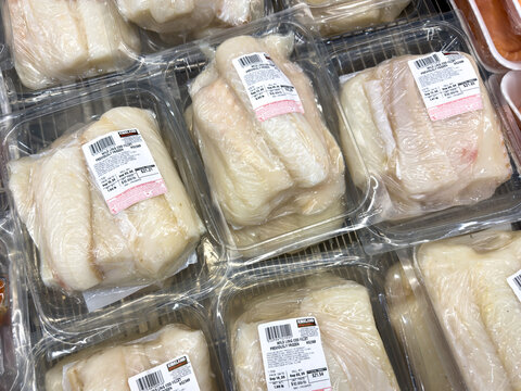 Prosper, Texas, USA - September 16th, 2026: Kirkland Signature wild ling cod fillet on store shelf inside Costco warehouse seafood display section