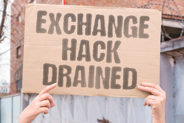 "Exchange hack drained" Hackers empty digital vault holdings. HACKERS. VAULT. DRAINED. THEFT. SECURITY. © AndriiKoval
