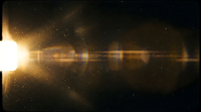 Cinematic film light leak with dust particles and lens flare effect, golden glowing overlay for vintage video transitions and artistic photography enhancement