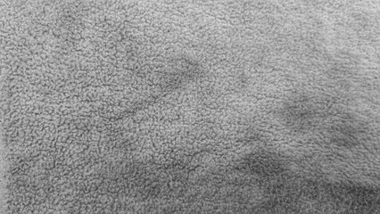 Grey soft sherpa fleece fabric texture, close-up full frame background © widyuta
