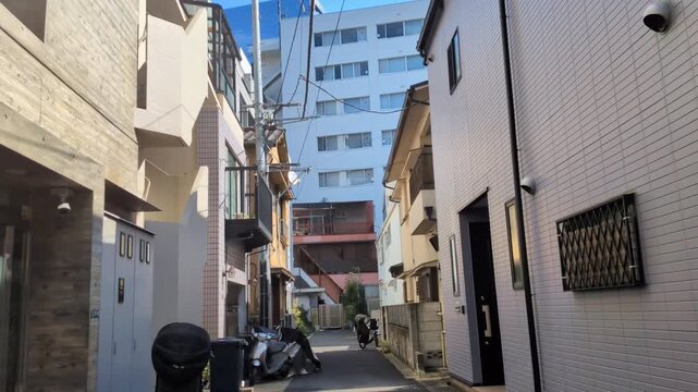 Quiet narrow residential alley in Tokyo, Japan, daytime