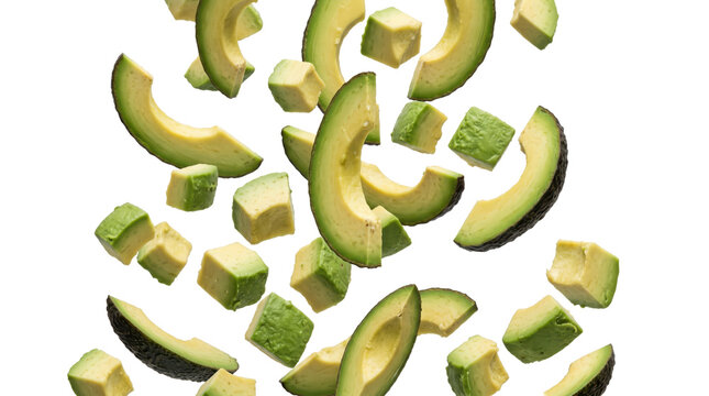 Falling avocado slices and cubes isolated